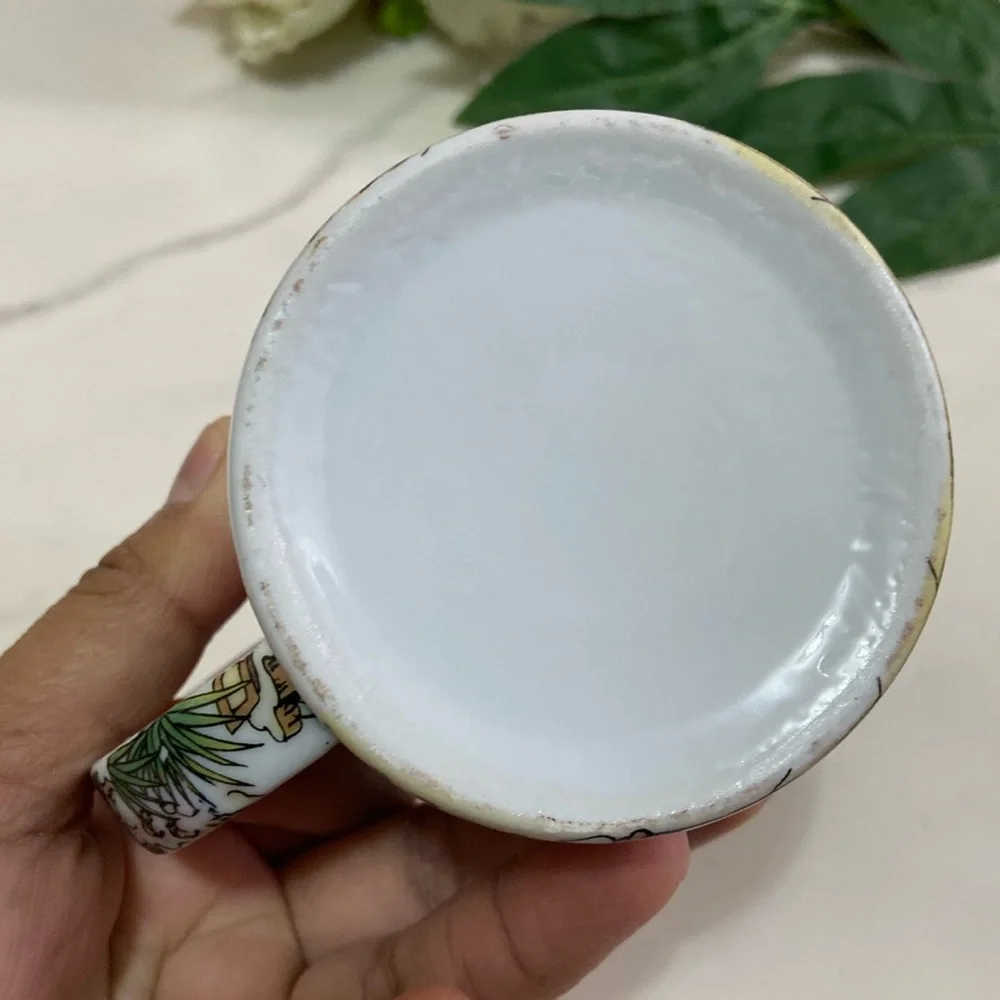 Asian Lady’s Collectible Coffee Cup